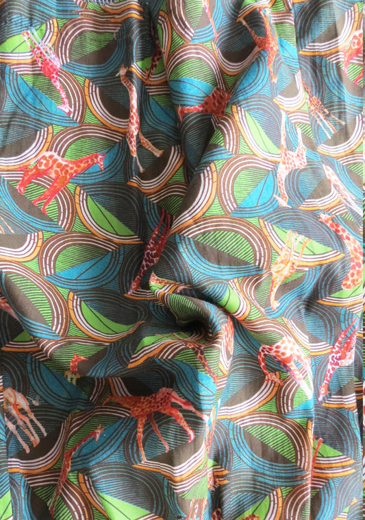 TISSU EN COTON LÉGER IMPRIMÉ WAX VERT GIRAFE